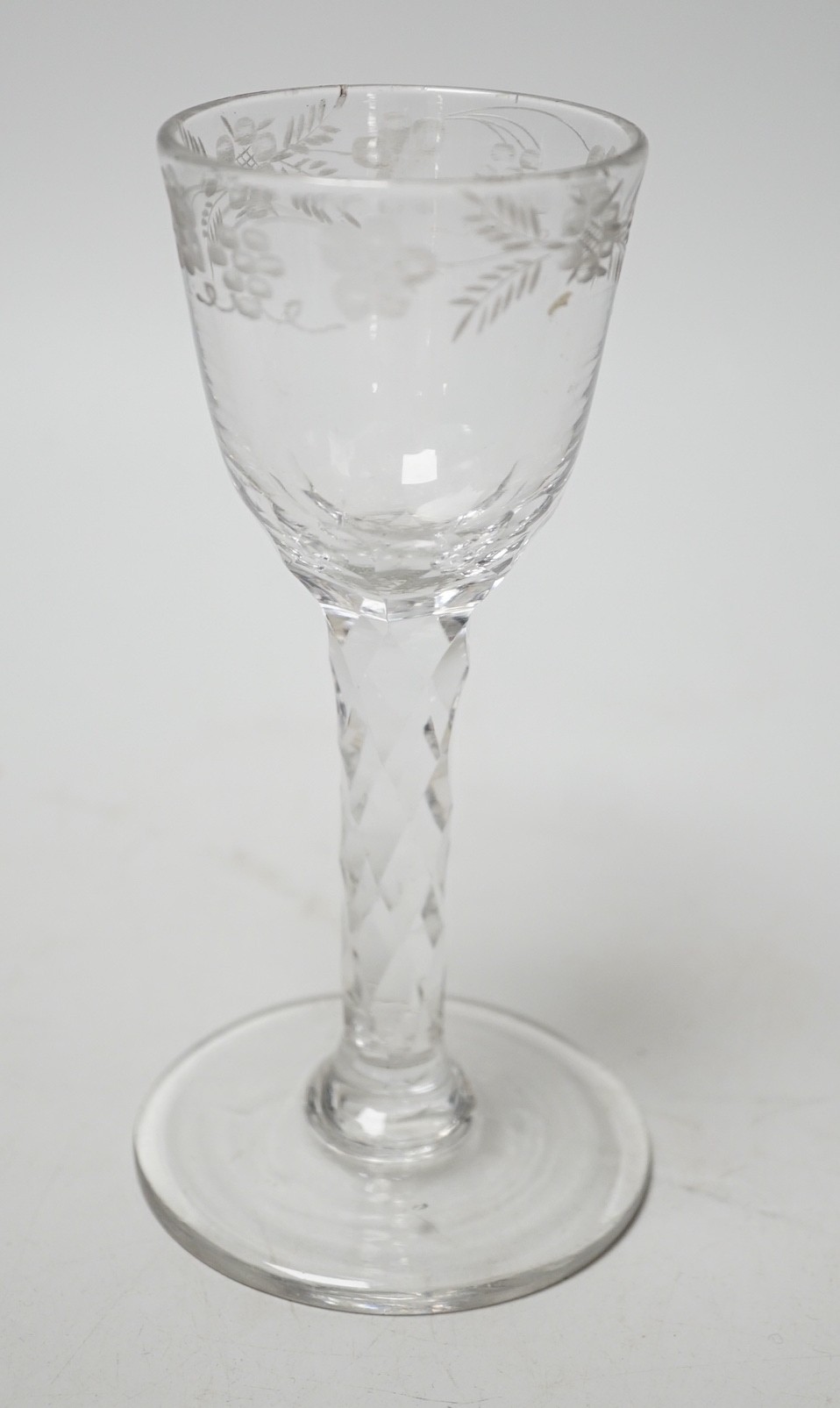 A George III facet stem wine glass. 15.5cm tall